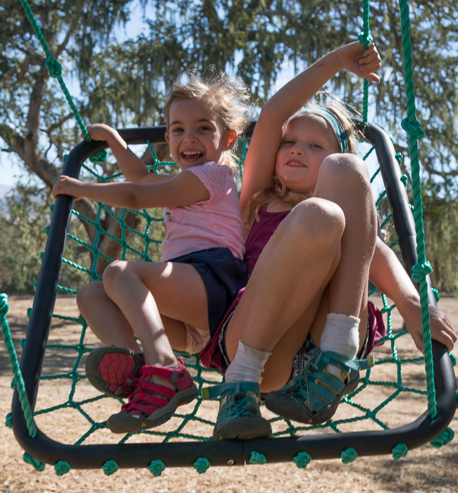 Swing was moving fast, one handed camera, f/5.6 @ 1/500, ISO 100, Plus a stop in post, +71 shadow move